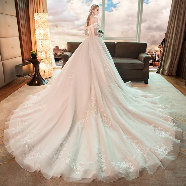 Meilleur Ivoire Transparentes Robe De Mariée 2019 Princesse De l'épaule Manches Longues Dos Nu Appliques En Dentelle Cathedral Train Volants