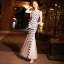 Chic / Belle Ivoire Robe De Soirée 2019 Trompette / Sirène V-Cou Sans Manches Rayé Paillettes Longue Volants Dos Nu Robe De Ceremonie