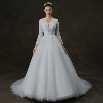Élégant Blanche Percé Robe De Mariée 2019 Princesse V Cou Manches Longues Perlage Perle Glitter Tulle Chapel Train Volants