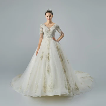 Élégant Champagne Robe De Mariée 2019 Princesse V Cou Manches Courtes Dos Nu Perlage Gland Appliques En Dentelle Glitter Tulle Cathedral Train Volants