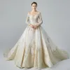 Luxury / Gorgeous Champagne See-through Wedding Dresses 2019 A-Line / Princess Scoop Neck Long Sleeve Backless Appliques Lace Beading Glitter Tulle Cathedral Train Ruffle