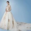 Romantic Champagne See-through Wedding Dresses 2019 A-Line / Princess Scoop Neck Long Sleeve Backless Appliques Lace Pearl Glitter Tulle Cathedral Train Ruffle