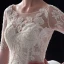 Illusion Champagne Pierced Wedding Dresses 2019 Ball Gown Scoop Neck 3/4 Sleeve Backless Appliques Lace Beading Cathedral Train Cascading Ruffles