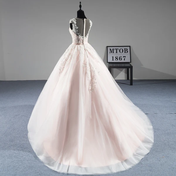 Chic Champagne Transparentes Robe De Mariée 2019 Princesse Encolure Dégagée Sans Manches Ceinture Appliques En Dentelle Perlage Perle Tribunal Train Volants