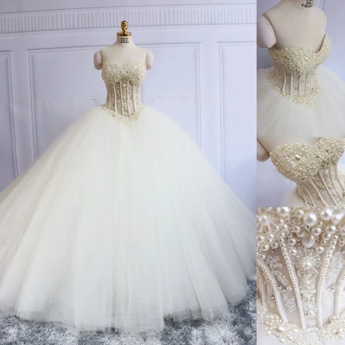 Luksus Elfenben Korsett Brudekjoler 2019 Ballkjole Kjæreste Uten Ermer Ryggløse Beading Perle Domstol Tog Buste
