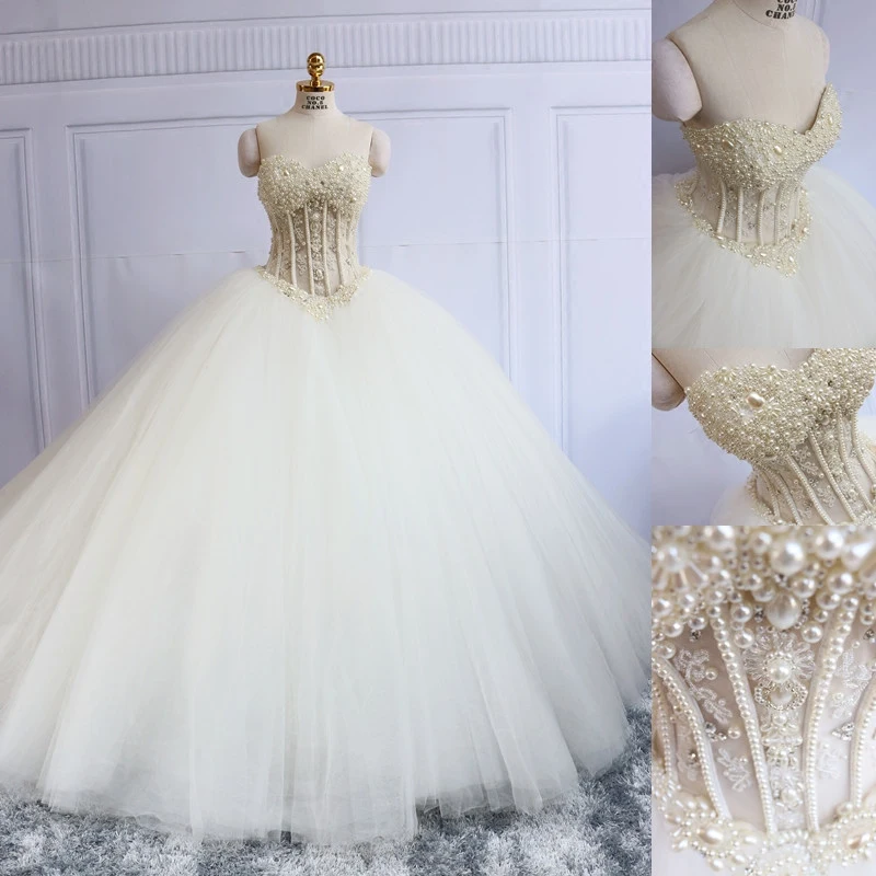 Luksus Elfenben Korsett Brudekjoler 2019 Ballkjole Kjæreste Uten Ermer Ryggløse Beading Perle Domstol Tog Buste