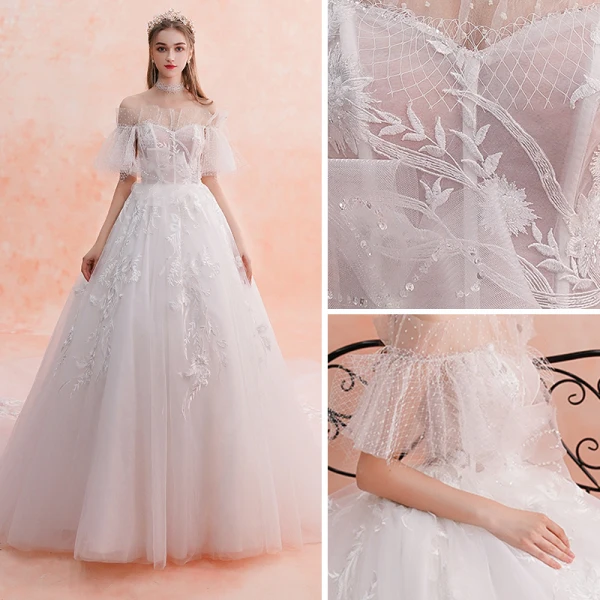 Meilleur Ivoire Robe De Mariée 2019 Princesse De l'épaule Manches Courtes Dos Nu Appliques En Dentelle Perlage Chapel Train Volants