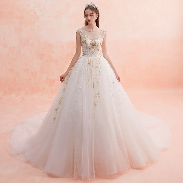 Luxe Champagne Transparentes Robe De Mariée 2019 Princesse Encolure Carrée Sans Manches Dos Nu Appliques En Dentelle Fait main Perlage Cathedral Train Volants