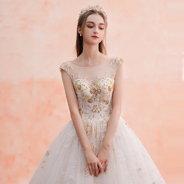 Luxe Champagne Transparentes Robe De Mariée 2019 Princesse Encolure Carrée Sans Manches Dos Nu Appliques En Dentelle Fait main Perlage Cathedral Train Volants