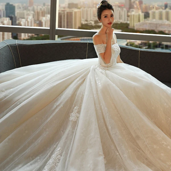 Modest / Simple Ivory Wedding Dresses 2018 Ball Gown Off-The-Shoulder Short Sleeve Backless Appliques Lace Ruffle Royal Train
