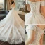 Modest / Simple Ivory Wedding Dresses 2018 Ball Gown Off-The-Shoulder Short Sleeve Backless Appliques Lace Ruffle Royal Train