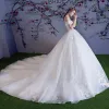 Stunning White Wedding Dresses 2018 Ball Gown Off-The-Shoulder Short Sleeve Appliques Backless Lace Pearl Sequins Ruffle Royal Train