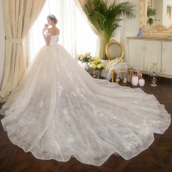 Stunning Champagne Wedding Dresses 2018 Ball Gown Off-The-Shoulder Short Sleeve Backless Lace Appliques Flower Pearl Ruffle Royal Train