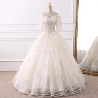 Elegant Champagne Wedding Dresses 2018 Ball Gown Off The Shoulder 1 2 Sleeves Backless Appliques Lace Beading Pearl Tassel Ruffle Floor Length Long