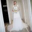 Sexy Ivoire Transparentes Robe De Soirée 2018 Princesse Encolure Dégagée Sans Manches Tachetée Ceinture Tribunal Train Volants Dos Nu Robe De Ceremonie