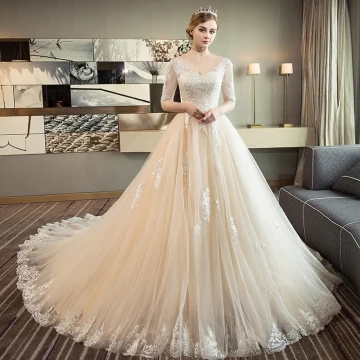Élégant Champagne Robe De Mariée 2018 Robe Boule V Cou 1 2 Manches Dos Nu Appliques En Dentelle Paillettes Perle Volants Cathedral Train