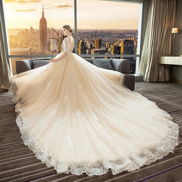 Elegant Champagne Wedding Dresses 2018 Ball Gown V-Neck 1/2 Sleeves Backless Appliques Lace Sequins Pearl Ruffle Cathedral Train