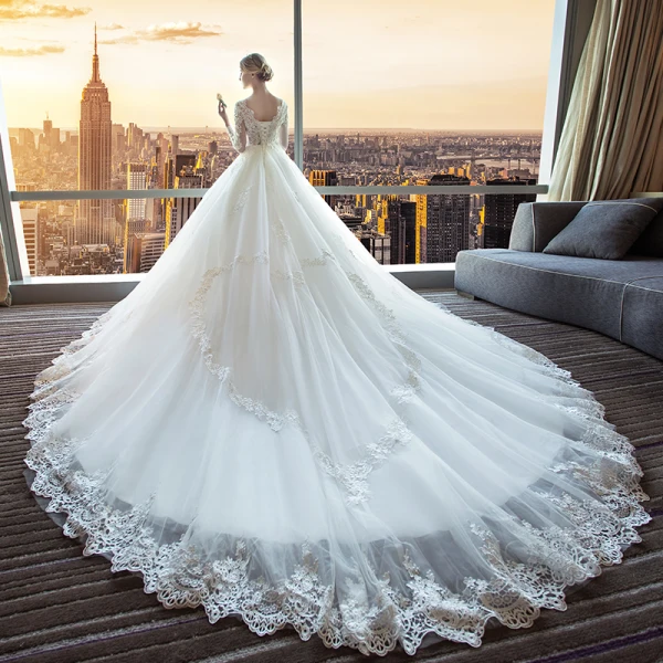 Schöne Ivory / Creme Durchsichtige Brautkleider 2018 Ballkleid V-Ausschnitt Lange Ärmel Rückenfreies Applikationen Mit Spitze Rüschen Königliche Schleppe