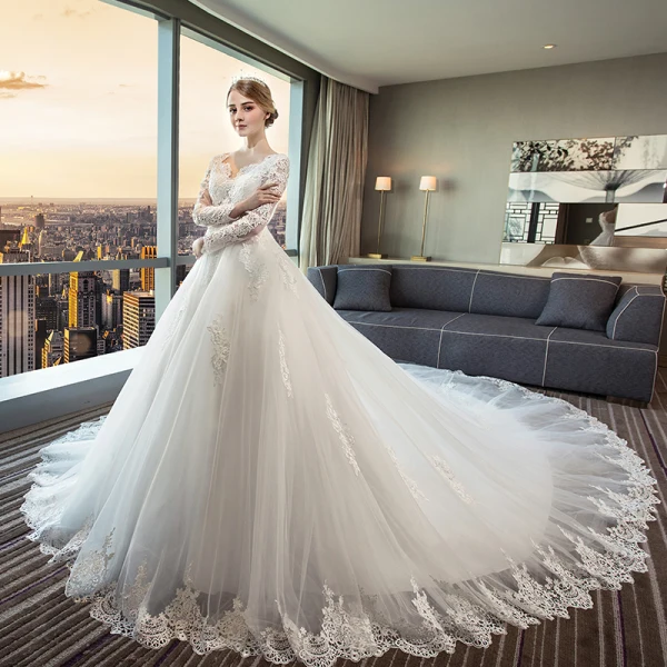 Schöne Ivory / Creme Durchsichtige Brautkleider 2018 Ballkleid V-Ausschnitt Lange Ärmel Rückenfreies Applikationen Mit Spitze Rüschen Königliche Schleppe