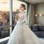 Schöne Ivory / Creme Durchsichtige Brautkleider 2018 Ballkleid V-Ausschnitt Lange Ärmel Rückenfreies Applikationen Mit Spitze Rüschen Königliche Schleppe