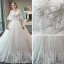 Schöne Ivory / Creme Brautkleider / Hochzeitskleider 2018 Ballkleid Off Shoulder 1/2 Ärmel Applikationen Spitze Pailletten Perlenstickerei Rückenfreies Rüschen Kapelle-Schleppe