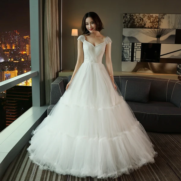 Chic / Beautiful Hall Wedding Dresses 2017 Lace Appliques Pearl Rhinestone Beading Backless Cascading Ruffles V-Neck Short Sleeve Floor-Length / Long White A-Line / Princess