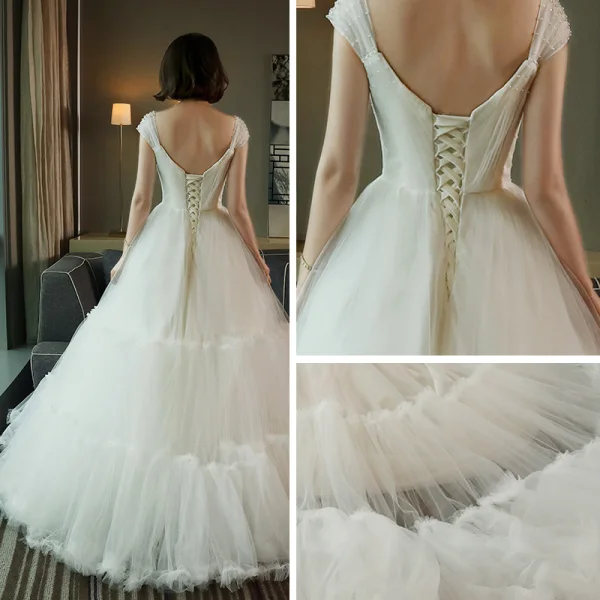 Chic / Beautiful Hall Wedding Dresses 2017 Lace Appliques Pearl Rhinestone Beading Backless Cascading Ruffles V-Neck Short Sleeve Floor-Length / Long White A-Line / Princess