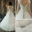 Chic / Beautiful Hall Wedding Dresses 2017 Lace Appliques Pearl Rhinestone Beading Backless Cascading Ruffles V-Neck Short Sleeve Floor-Length / Long White A-Line / Princess