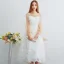 Chic / Belle Ivoire de retour Robe De Graduation 2019 Princesse De l'épaule Bretelles Spaghetti Gonflée Manches Longues Appliques En Dentelle Thé Longueur Dos Nu Robe De Ceremonie