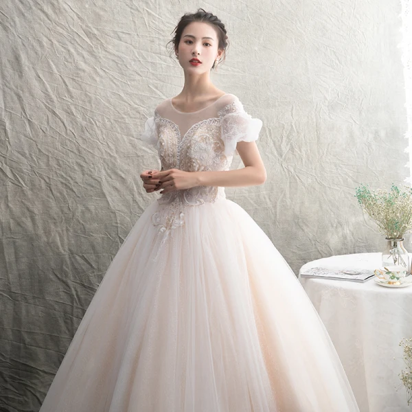 Chic Champagne Transparentes Robe De Mariée 2019 Princesse Encolure Dégagée Gonflée Manches Courtes Dos Nu Appliques En Dentelle Perlage Tachetée Tulle Longue Volants