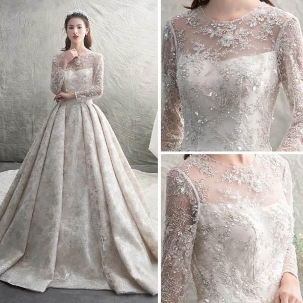 Luxus / Herrlich Ivory / Creme Durchsichtige Brautkleider / Hochzeitskleider 2019 A Linie Rundhalsausschnitt Lange Ärmel Rückenfreies Handgefertigt Perlenstickerei Perle Pailletten Kathedrale Schleppe Rüschen