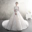 Luxury / Gorgeous Champagne See-through Wedding Dresses 2019 A-Line / Princess High Neck Long Sleeve Backless Appliques Lace Beading Glitter Tulle Cathedral Train Ruffle