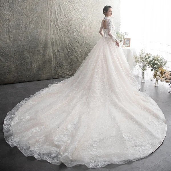 Luxury / Gorgeous Champagne See-through Wedding Dresses 2019 A-Line / Princess High Neck Long Sleeve Backless Appliques Lace Beading Glitter Tulle Cathedral Train Ruffle