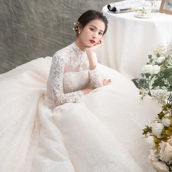 Luxury / Gorgeous Champagne See-through Wedding Dresses 2019 A-Line / Princess High Neck Long Sleeve Backless Appliques Lace Beading Glitter Tulle Cathedral Train Ruffle