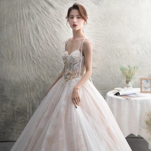 Chic Beautiful Champagne Wedding Dresses 2019 A Line Princess Spaghetti Straps Sleeveless Backless Appliques Lace Pearl Beading Chapel Train Ruffle