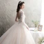 Illusion Champagner Durchsichtige Brautkleider / Hochzeitskleider 2019 A Linie Stehkragen Lange Ärmel Rückenfreies Applikationen Spitze Perlenstickerei Lange Rüschen