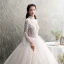 Illusion Champagner Durchsichtige Brautkleider / Hochzeitskleider 2019 A Linie Stehkragen Lange Ärmel Rückenfreies Applikationen Spitze Perlenstickerei Lange Rüschen