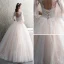Illusion Champagne See-through Wedding Dresses 2019 A-Line / Princess Scoop Neck 3/4 Sleeve Backless Appliques Lace Beading Glitter Tulle Floor-Length / Long Ruffle
