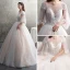 Illusion Champagne See-through Wedding Dresses 2019 A-Line / Princess Scoop Neck 3/4 Sleeve Backless Appliques Lace Beading Glitter Tulle Floor-Length / Long Ruffle