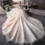 Élégant Champagne Transparentes Robe De Mariée 2019 Princesse Encolure Dégagée Mancherons Dos Nu Appliques En Dentelle Perlage Cathedral Train Volants