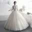 Illusion Champagner Durchsichtige Brautkleider / Hochzeitskleider 2019 A Linie Stehkragen Glockenhülsen Rückenfreies Applikationen Spitze Perlenstickerei Lange Rüschen