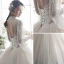 Illusion Champagner Durchsichtige Brautkleider / Hochzeitskleider 2019 A Linie Stehkragen Glockenhülsen Rückenfreies Applikationen Spitze Perlenstickerei Lange Rüschen