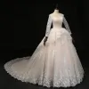 Affordable Champagne Wedding Dresses 2018 Ball Gown Scoop Neck Long Sleeve See-through Appliques Lace Pearl Ruffle Royal Train