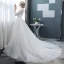 Abordable Blanche Transparentes Robe De Mariée 2018 Robe Boule Col Haut Manches Longues Dos Nu Perle Volants Chapel Train