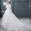 Abordable Blanche Transparentes Robe De Mariée 2018 Robe Boule Col Haut Manches Longues Dos Nu Perle Volants Chapel Train