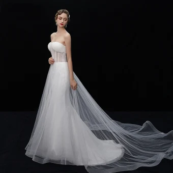 Glamour Ivoire Transparentes Robe De Mariée 2019 Trompette Sirène Bustier Sans Manches Dos Nu Chapel Train Volants