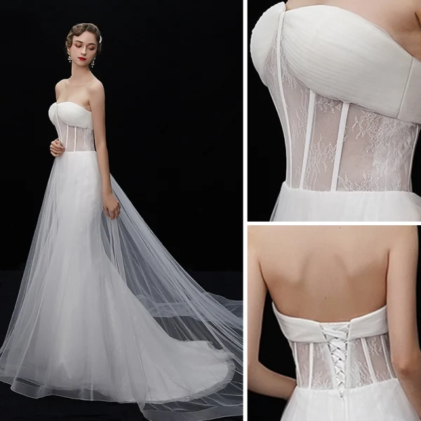 Glamour Ivoire Transparentes Robe De Mariée 2019 Trompette / Sirène Bustier Sans Manches Dos Nu Chapel Train Volants