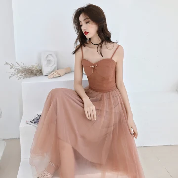 Abordable Orange De Retour Robe De Graduation 2019 Princesse Bretelles Spaghetti Sans Manches Thé Longueur Volants Dos Nu Robe De Ceremonie