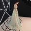 Fée Des Fleurs Vert Cendré Transparentes Robe De Soirée 2019 Princesse V-Cou Sans Manches Appliques En Dentelle Noeud Ceinture Train De Balayage Volants Dos Nu