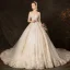 Elegant Champagne Wedding Dresses 2019 Ball Gown Off-The-Shoulder 1/2 Sleeves Backless Appliques Lace Beading Glitter Tulle Cathedral Train Ruffle